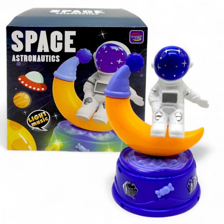 Космонавт на батарейках, їздить, музика, світло, в коробці (р.13,5х13,5х13 см)