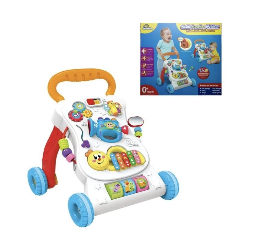 Фото1.Каталка-ходунки світло, звук, мелодії, знімна панель, фрази на англійській мові, в коробці