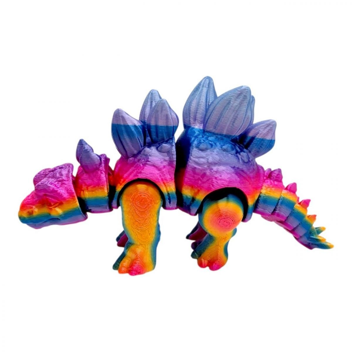 Фото1.Іграшка рухлива 3D Динозавр 18 см, Стегозавр (ВЕСЕЛКОВИЙ)