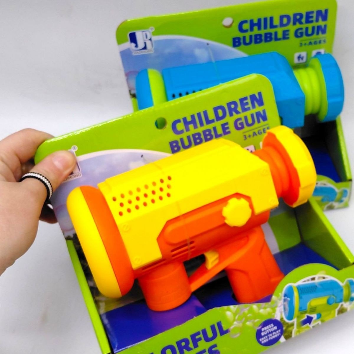 Фото2.Мильні бульбашки пістолет, короб. (ПОМАРАНЧЕВИЙ)