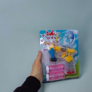 Фото1.Пістолет з мильними бульбашками, на батарейках