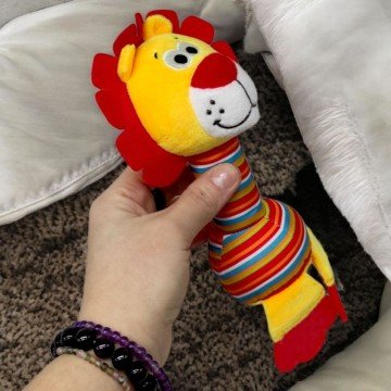 Фото1.Мʼяка іграшка-брязкальце з дзвіночком, лев