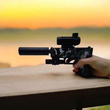 Фото1.Іграшкова зброя Пістолет з орбізами, глушник, лазерний приціл