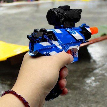 Фото1.Пістолет стріляє орбізами, в коробці (американський)