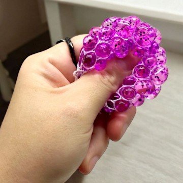 Фото1.Антистрес з блискітками у білій сітці, 4 см (Мікс)