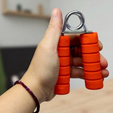 Фото1.Еспандер металевий,4 кольори, пакет 12*2*13 см