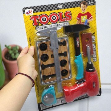 Фото1.Набір інструментів (дриль, молоток, штангенциркуль, рулетка, на листі)