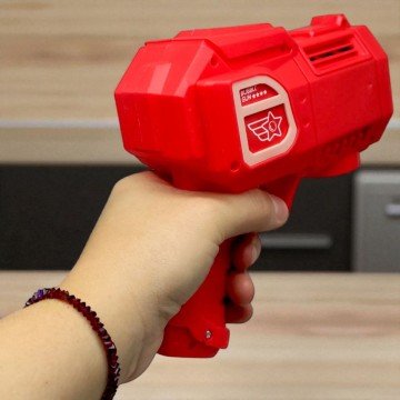 Фото1.Пістолет з мильними бульбашками в коробці (червоний)