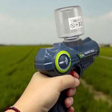 Фото1.ВОДНИЙ ПІCТОЛЕТ З ПЛЯШКОЮ 15,5 СМ (БІРЮЗОВИЙ)