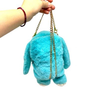 Фото1.Мʼяка іграшка-рюкзак 