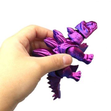 Фото1.Іграшка рухлива 3D Динозавр 18 см, Стегозавр (ПОМАРАНЧЕВИЙ  ГРАДІЄНТ)