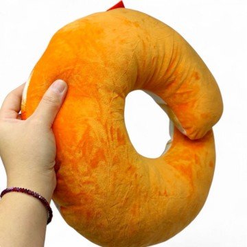 Фото1.М'яка іграшка підголовник 