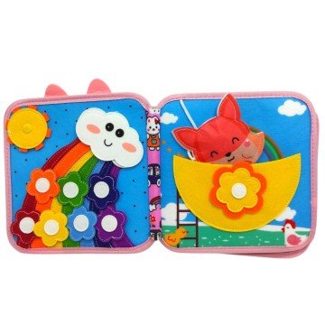 Фото1.Мʼяка книжка-бізіборд 