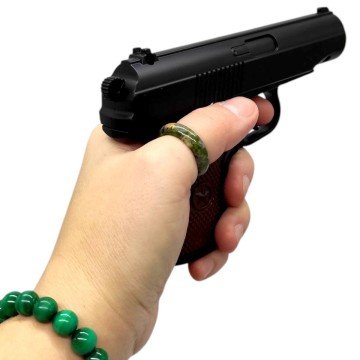 Фото1.Пістолет з металевими деталями (коробка 18*13*3 см)