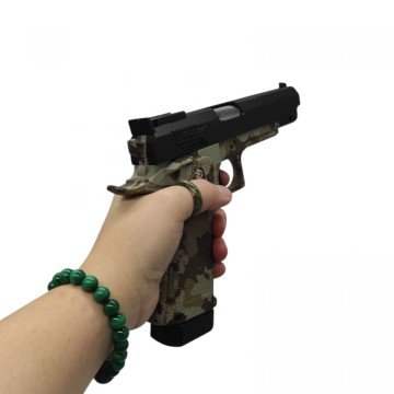 Фото1.Пістолет мет. у короб. 25*18*4,5 см