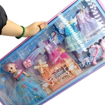 Фото1.Лялька (висота: 27 см, шарнірні з’єднання, прошите волосся, знімний одяг, взуття, 3 додаткові сукні,