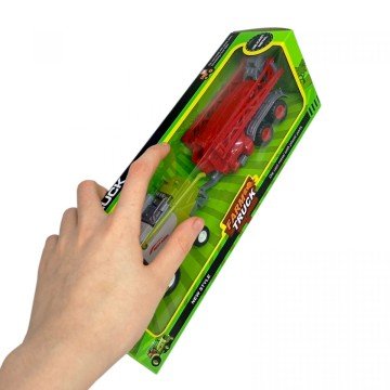 Фото1.КОМБАЙН З ЗЕЛЕНИМ ПРИЧЕПОМ