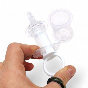 Фото1.Шприц-дозатор з мірним стаканчиком (РОЖЕВИЙ)