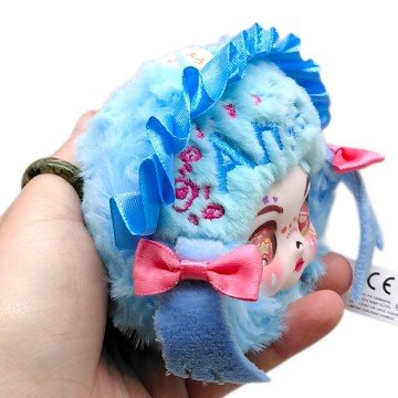 Фото1.Іграшка-брелок мʼяконабивна 