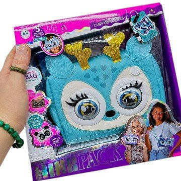 Фото1.Інтерактивна сумочка (кліпає, звуки, музика, реагує на дотик)