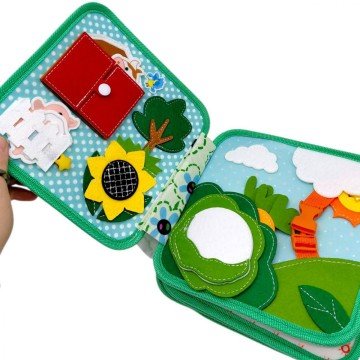 Фото1.Мʼяка книжка-бізіборд 