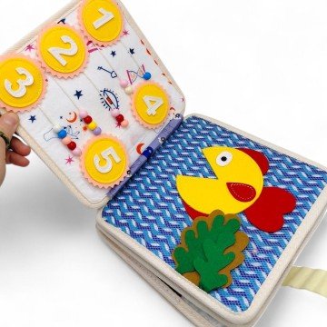 Фото1.Мʼяка книжка-бізіборд 