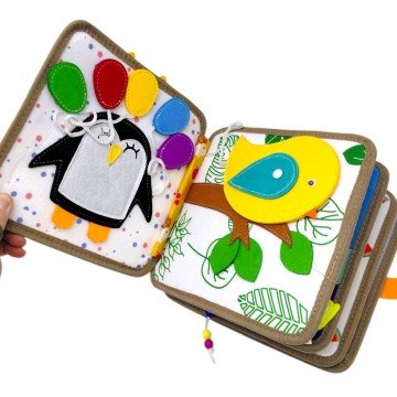 Фото1.Мʼяка книжка-бізіборд 