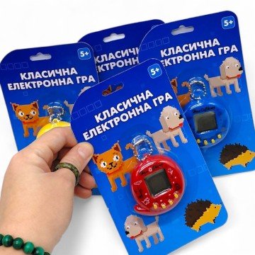 Фото2.ЕЛЕКТРОННА ГРА ТАМАГОЧІ (ЧЕРВОНИЙ)