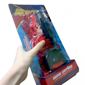 Фото1.Набір героя рукавичка, механічна установка для стрільби водою, на листі