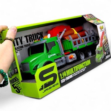 Фото1.Машина лісовоз з маніпулятором інерційна; озвучена, зі світлом (в коробці 34,5x13x18 см)