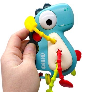 Фото1.Брязкальце “Динозавр” (поп-іт, гумові прорізувачі та елементи для перетягування) (БІРЮЗОВИЙ)
