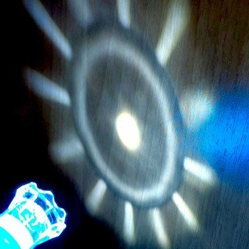 Фото1.Брелок ліхтарик квітка гостра різнокольорова 9 см