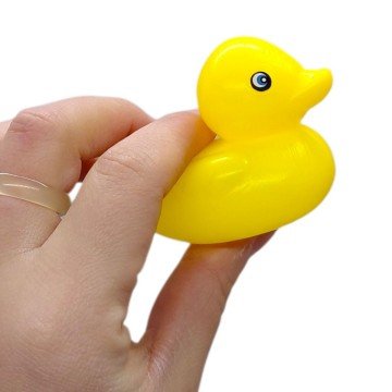 Фото1.Пірамідка, висота 32 см, фігурка тваринки, 10 кілець різного діаметру, в сітці