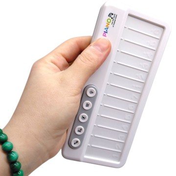 Фото1.Піаніно (сенсорні клавіші, підсвічування, кілька режимів, музичні інструменти, 13 клавіш, мелодії, р