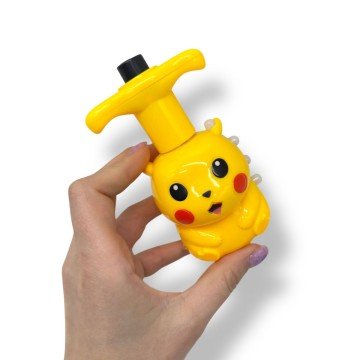 Фото1.Дзиґа, що світиться Покемон