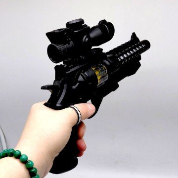 Фото1.Пістолет пластиковий, що світиться (24 см)