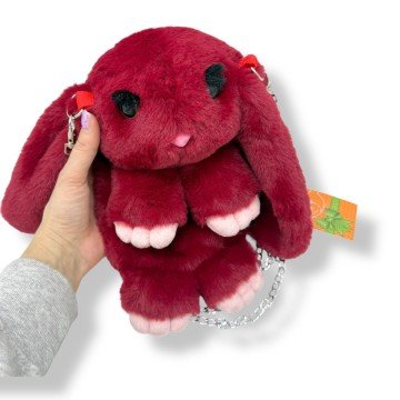 Фото1.Мʼяка іграшка-рюкзак 