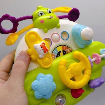 Фото2.Бізіборд “Кермо”, гумові мотузочки, спінер, пальчикові ігри, попіт, пискавка, тріскачка, замок запал