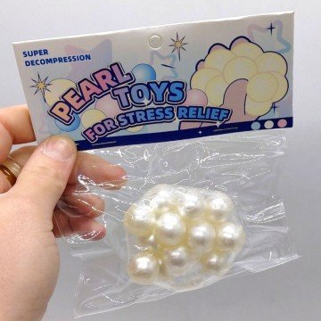 Фото1.Гра антистрес (силіконова кулька, великі перлинки, в коробці)