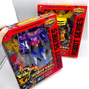 Фото1.Трансформер, кінцівки обертаються, зброя, пластикові колеса, в коробці (ФІОЛЕТОВИЙ)