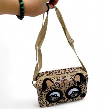 Фото2.Інтерактивна сумочка (кліпає, звуки, музика, реагує на дотик)