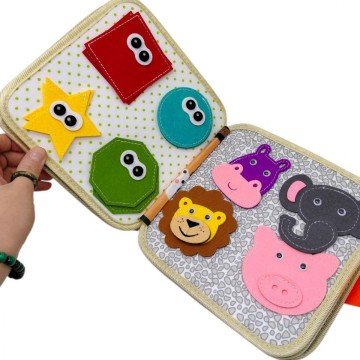 Фото2.Мʼяка книжка-бізіборд 