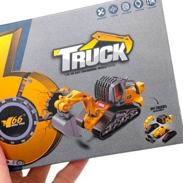 Фото2.Металевий трактор з набором ковшів (7х12х17см)