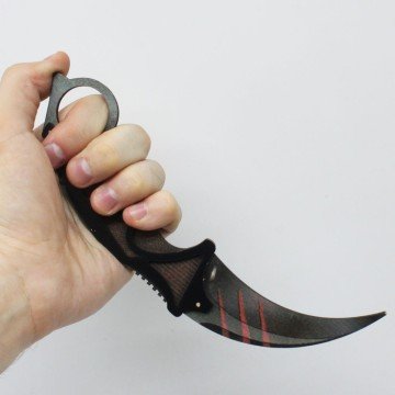 Фото3.Сувенірний ніж «Керамбіт SCRATCH», слід