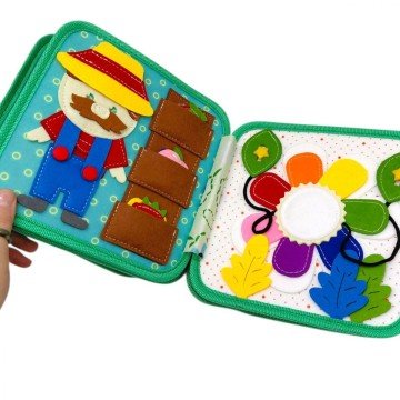 Фото3.Мʼяка книжка-бізіборд 