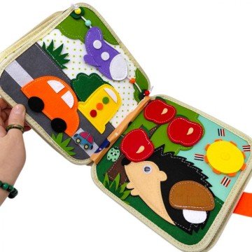 Фото3.Мʼяка книжка-бізіборд 