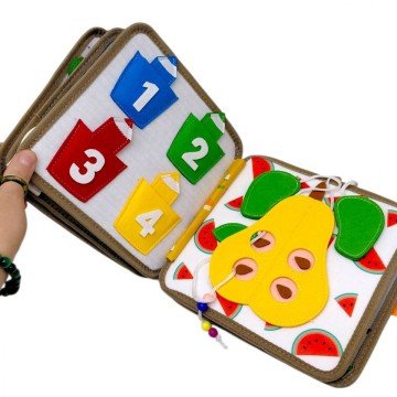 Фото3.Мʼяка книжка-бізіборд 