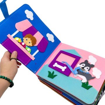 Фото3.Мʼяка книжка-бізіборд 